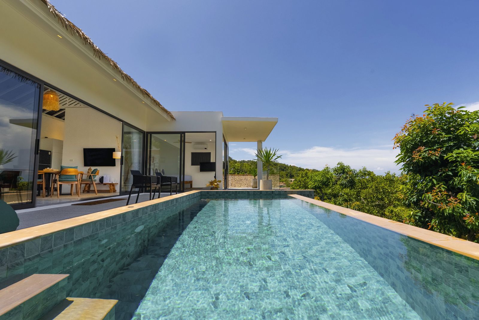 Infinity pool at a Pahili villa on Koh Phangan, looking over the jungle to the sea